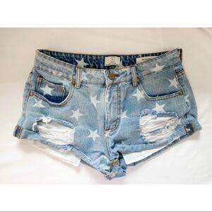 Star print jean shorts